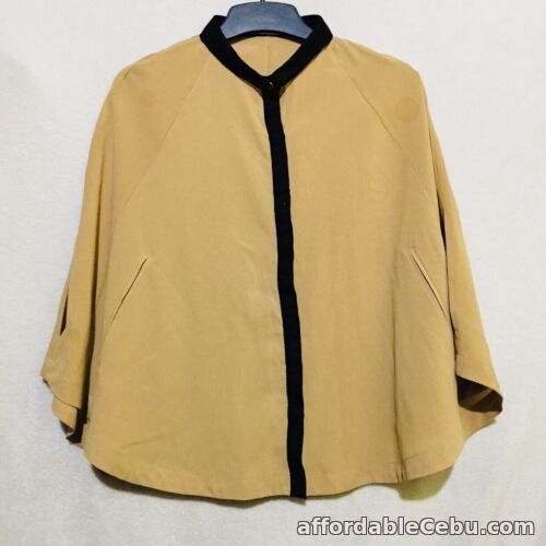 1st picture of Beige contrast trim poncho For Sale in Cebu, Philippines
