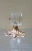 Solid shaped Glass candleholder with golden flowery metal base